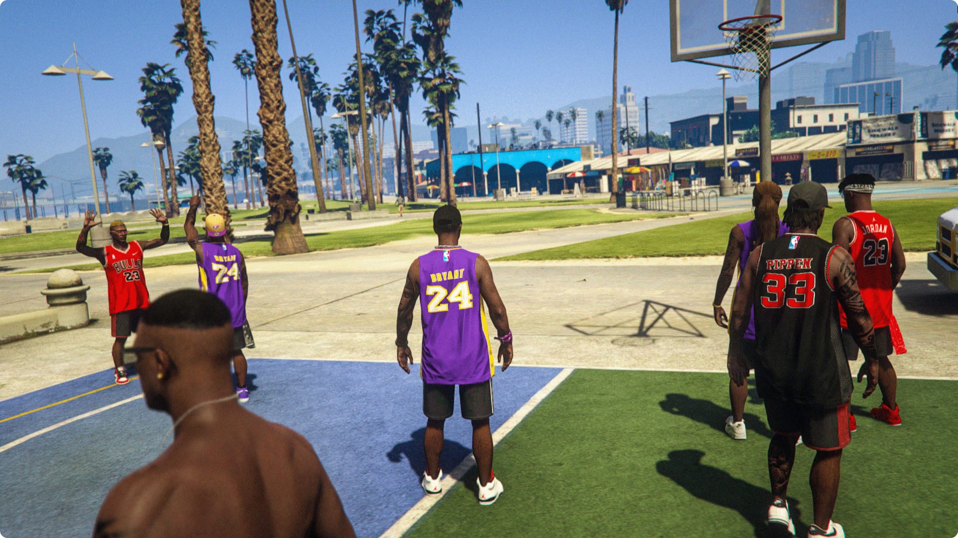 Players gathering on an outdoor basketball court